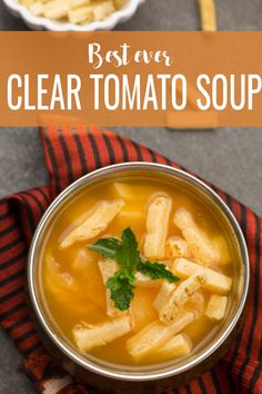 a bowl of clear tomato soup with parsley in it and the title above reads best ever clear tomato soup