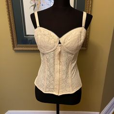 Vintage bustier with detachable shoulder straps. B cup. Excellent design with front hook and eye and zipper over top to provide lots of structure. Shown fitting loosely on a size 6 mannequin. Luxury Vintage Bustier Bodice, Vintage Bustier, Corset Lingerie, B Cup, Hook And Eye, Corsets, Shoulder Straps, Lingerie, Size 6