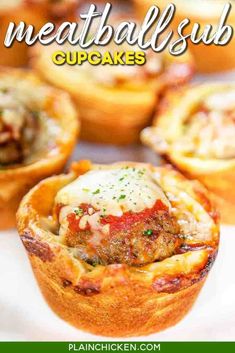 meatball cupcakes with cheese and sauce in the middle on a white plate