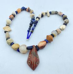 Rare Unique Ancient Near Eastern Regions And Cultures Ancient Civilizations Cultures Old Agate Carnelian And Lapis Beads Necklace. Size Details Pictures Are Listed Above. Conditions As Shown In The Pictures. Rich In Patina. We Provide Fast And Free Shipping Service World Wide To Our Customers .We Ship Mostly Via Fedex And DHL. If You Have Any Questions Please Feel Free To Send Us Message. Amulet Necklace With Oval Beads, Amulet Style Hand-strung Necklaces With Oval Beads, Hand-strung Oval Beads Amulet Necklace, Hand-strung Amulet Necklaces With Oval Beads, Amulet Style Large Beads For Gifts, Amulet Style Necklace With Large Bead Pendant, Amulet Necklaces With Large Oval Beads, Healing Amulet Beaded Pendant Necklace, Healing Pendant Necklaces With Large Beads