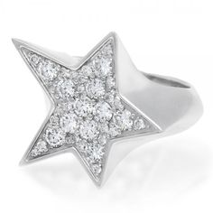 a white gold ring with diamonds in the shape of a star, on a white background