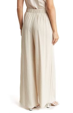 A stretchy waistband brings all-day comfort to linen-blend pants with a breezy wide-leg silhouette. Elastic waist Pulls on 50% linen, 50% rayon  Machine wash, line dry  Imported Beach Linen Bottoms With Elastic Waistband, Full Length Cotton Bottoms For Vacation, Chic Linen Loungewear Bottoms, Chic Linen Bottoms For Loungewear, Relaxed Neutral Bottoms For Vacation, Linen Bottoms With Elastic Waistband For Vacation, Chic Neutral Bottoms For Vacation, Beach Bottoms With Elastic Waistband In Neutral Color, Versatile Beige Linen Wide Leg Pants