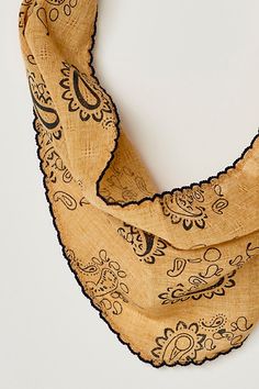 Add *the* ideal finish to every ‘fit with this stunning hair scarf featured in a staple, bandana-inspired silhouette and soft gauze fabrication with vintage-inspired printing, scalloped trim, and elasticated bottom hem for an added effortless touch. | Parker Printed Hair Scarf by Free People in Tan Vintage One-size Bandana For Summer, Vintage Bandana For Summer, Bohemian Bandana Print Headscarf For Summer, Bohemian Bandana Print Scarves For Summer, Summer Bandana Print Headscarf, Bohemian Bandana Print Headscarf For Beach, Bohemian Patterned Bandana For Spring, Summer Bandana Print One-size Headscarf, Summer Bandana Print Headscarf One Size