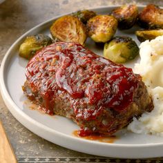 meatloaf, mashed potatoes and brussel sprouts on a plate