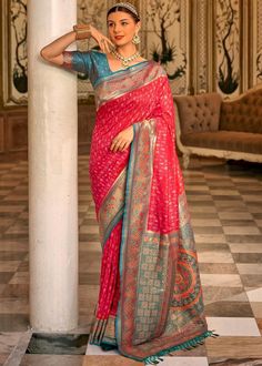 This exquisite Woven Banarasi Saree epitomizes timeless elegance and rich heritage. Crafted with intricate zari work, the luxurious silk fabric shimmers with every movement. Perfect for weddings and grand celebrations, it showcases a blend of traditional craftsmanship and contemporary design. Drape yourself in this regal masterpiece for an unforgettable, sophisticated look. --------------------------------- S A R E E ● D E T A I L S --------------------------------- ● Fall and Edging : Done ● Tassel : See in Option ● Petticoat : On request Extra Charges ● Drapping Saree (Ready to wear) : On Request Extra Charges ● Blouse : Matching Unstitched Piece (See in option) ● Occasion : Wedding, Party, Festive, Function ● Type: Bollywood ● Includes : 1 Saree, 1 Blouse Piece ● Saree length : 5.5 mete Drapping Saree, Handloom Weaving, Weaving Designs, Banarasi Silk Saree, Red Saree, Silk Saree With Blouse, Banarasi Saree, Zari Work, Blouse Material