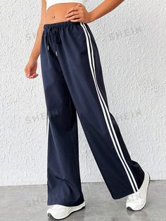 Details:Drawstring \nStyle:Casual \nClosure Type:Drawstring Waist \nDetails:Side Stripe \nColor:White \nPattern Type:Striped \nType:Wide Leg \nWaist Line:Natural \nLength:Long \nFit Type:Loose \nFabric:Non-Stretch \nMaterial:Woven Fabric \nComposition:100% Polyester \nCare Instructions:Hand wash or professional dry clean \nTemperature:Spring/Fall (18-25℃/63-77℉) \nBody:Unlined \nSheer:No \n Women Sweatpants, Traje Casual, Women Pants, Printed Drawstring, Side Stripe, Drop Waist, Athletic Wear, Womens Sweatpants, Wide Leg Trousers