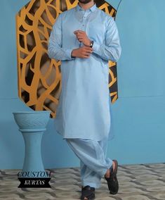 Classic Sky Blue Men's Shalwar Kameez | Elegant and Timeless Elevate your wardrobe with our classic Navy Blue Men's Shalwar Kameez, a perfect blend of tradition and modern style. This versatile outfit is crafted from high-quality, breathable fabric, ensuring comfort and durability. The rich Navy Blue color adds a touch of sophistication, making it ideal for both casual and formal occasions.   Men's Sky Blue Shalwar Kameez Traditional Wear Premium Elegant Shalwar Kameez | Shirt Collar Kameez Shal Blue Cotton Sherwani With Dabka Work, Blue Naqshi Straight Kurta Traditional Wear, Blue Jamawar Lawn Suit For Festivals, Festive Blue Traditional Wear With Naqshi, Blue Cotton Unstitched Formal Suit, Unstitched Blue Jamawar Kurta, Traditional Blue Kurta With Naqshi, Blue Jamawar Salwar Kameez With Straight Kurta, Eid Cambric Straight Kurta Traditional Wear