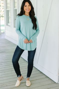 This classic top won't let you down! It's simplistic versatility gives you so much freedom to style it! The comfy fit also makes is a dream to wear! You really can't go wrong with this long sleeve top! Round neckline Long sleeves Curved hemline Generous stretch Cindy is wearing the small. Plain Tops For Layering In Fall, Casual Long Sleeve Top With Thumbholes For Fall, Versatile Solid Color Long Sleeve Top, Versatile Long Sleeve Solid Color Top, Solid Color Long Sleeve Tops For Layering, Solid Color Long Sleeve Top With Thumbholes For Fall, Long Sleeve Solid Color Tops For Layering, Long Sleeve Plain Tops For Layering, Casual Tops With Thumbholes For Fall