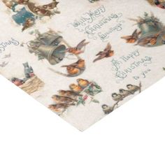 an image of christmas wrapping paper with birds and bells on it's side,