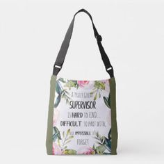 a tote bag with a quote on the front and floral print in green, white and pink