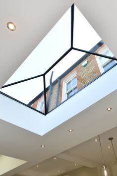 an open skylight in the middle of a room