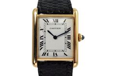 A nice vintage Cartier Tank Louis reference 78086 in 18k yellow gold, crafted during the 1980s. A popular and enduring classic from Cartier, featuring ivory dial, black Roman numeral markers and inner minute track, sword-shaped blued-steel hands and beaded blue cabochon crown encased by a 23.5mm rectangular case and slim 6mm silhouette. Paired with a black lizard strap and Cartier deployant buckle for a comfort fit, suitable for men or women.  Dial shows patina, crown has a nick on end, scratches on case. Original dial, hands and crown. Case measures 23.5 x 30mm, 6mm thick. Sapphire crystal.  Cartier cal. 2512-1(78-21) ETA, 17 jewels manual wind.  Case# 101xx New non-Cartier handmade black leather strap, fits 7 inches. 17mm lug width. Modeled on 6 inch wrist. This Cartier Tank has undergon Cartier Tank Louis, Black Lizard, Cartier Tank, Cartier Men, Blue Steel, Roman Numeral, Classic Watches, Blue Beads, Vintage Cartier