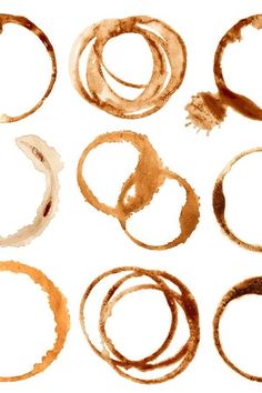 coffee stains in different shapes and sizes on a white background, set of eight images