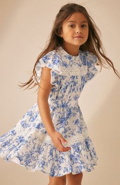 Summery sweetness pervades this floral-splashed dress fashioned from kid-friendly cotton with airy flutter sleeves and delicate lace trim. Back button closure; ties at back Lined 100% cotton Machine wash, tumble dry Imported European Kids Fashion, Spring Outfits Kids, Wild Meadow, Hygge Life, Preteen Fashion, Blue Floral Print Dress, Easter Dresses, Aboriginal Painting, Girls Easter Dresses