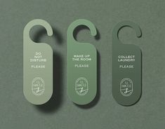 three door hangers that say do not disturbs, make up the room and please