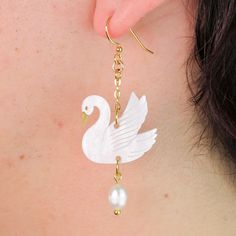 I think these might be the most beautiful earrings I've ever made! I can't get enough of the gorgeous pearly white and matching pearl dangling under this beautiful swan, all accented with gorgeous gold! Swan Earrings, Off With Their Heads, Beautiful Swan, Swan Song, Daisy Dukes, Laser Cut Acrylic, Acrylic Charms, Christmas Earrings, Painting Patterns