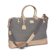 The perfect weekender bag for any adventure. Large enough to fit several outfits and small enough to throw in your passenger seat, this light grey canvas bag features a long adjustable and removable shoulder strap, vegan leather accents, and satin interior lining. (#2728) •Dimensions: 29.25"L x 6.25"W x 17.25"H Canvas Travel Bag, Leather Accents, Travel Collection, Personalize Bag, Duffel Bag, Weekender Bag, Toiletry Bag, Canvas Bag, Tan Leather