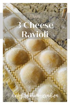 three cheese ravioli on a baking sheet with text overlay that reads 3 cheese ravioli