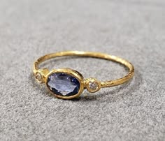 1. 18k Gold Blue Sapphire Ring 2. Made to Order 3. Gemstone - Blue Sapphire 4. Jewelry Type - Gold Ring 5. Total Weight - 1.030 Gram Approx 6. Sapphire Weight - 0.40 Carats 7. Diamond - 0.05 Carats 8. Gold Weight - 0.940 Grams Approx. 9. Sapphire Size - 4x6 MM 10. Gold Purity - 18k 11. Handmade Items 12. Band Size - 1 MM 13. Oval Blue Sapphire 14. AAA Quality 15. Stackable Ring 16. 1 Quantity Available Pictures are taken under natural and day light. Blue And Gold Rings, Oval Blue Sapphire Ring, Safire Rings Engagement Gold, Vintage Gold Sapphire Ring, Golden Sapphire Ring, Oval Gemstone Ring, Engagement Rings With Sapphires, Blue And Gold Ring, Gold Ring With Stone