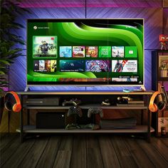 a large flat screen tv sitting on top of a wooden floor