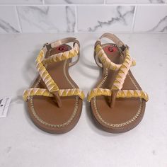 Vince Camuto Natural Tan Leather With Pink And Yellow Velvet Braided Straps. Gleaming Gold Chain Links Are Embedded In The Leather Sole Making This A Beautiful, Textural Thong Sandal. These Are Nwt, But No Box. Women’s Size 6. Please See All Photos For Detail. Hard To Find Color. Yellow Strappy Sandals For Spring, Yellow Closed Toe Sandals For Vacation, Yellow Synthetic Sandals For Vacation, Yellow Adjustable Sandals With Round Toe, Yellow Adjustable Ankle Strap Sandals, Yellow Adjustable Round Toe Sandals, Adjustable Yellow Sandals With Round Toe, Yellow Leather Sandals For Vacation, Yellow Flat Sandals With Adjustable Straps