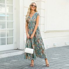 Immerse yourself in bohemian allure with our Paisley Print V-Neck Maxi Dress, where a mesmerizing paisley pattern and a flattering V-neckline unite to create a captivating and flowy ensemble that's perfect for embracing your wanderlust spirit and making a statement at any event. Product code: CAA05A3G075ZZ Model Wearing Size: S Height: 5‘6" in 168 cm Bust: 34 in 86 cm Waist: 25 in 63 cm Hips: 30 in 76 cm Paisley Pattern, Paisley Print, Cap Sleeves, Sleeve Styles, Fitness Fashion, Elastic Waist, Paisley, Maxi Dress, V Neck