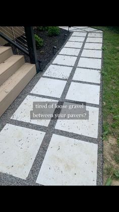 an outdoor walkway made out of concrete blocks