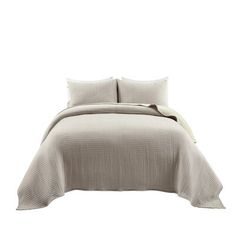 an image of a bed with white linens and pillows on the bottom half, in front of a white background