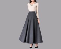 * A high-end long wool skirt with wide hem, very cool. * Made of wool blends, fully lined and with two side pockets. * Fixed waist and side invisible zipper. * Can custom make waist size and skirt length. * Material: Outer-50% wool, 50% polyester; lining-100% polyester * Washing instructions: Dry Clean Only * Size: True to US size, US 0-US 20 are available, you can let us know your usual size and height in your order. * Shipping: Free shipping Processing time : 5-7 Business days Delivery time : Chic Full Maxi Skirt For Winter, Elegant Wide Leg Maxi Skirt For Fall, Chic A-line Maxi Skirt For Winter, Long Wool Skirt For Spring, Wool Long Skirt For Spring, Elegant Winter Full Maxi Skirt, Chic A-line Maxi Skirt For Fall, Elegant Full Maxi Skirt For Winter, Flared Maxi Skirt For Fall Office Wear