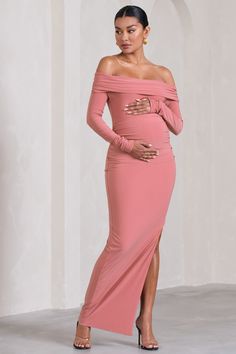 Crafted in a timeless silhouette. Kaylee was designed to see you through any occasion. This staple maternity maxi arrives in a soft pink shade of our signature stretch jersey known for its sculpting abilities. For the perfect dinner date ensemble. try styling Kaylee with some strappy stilettos and a sleek bun. Features - Premium stretch jersey- Bardot neckline - Long sleeves- Invisible zip closure - Bump ruching- High-leg split- Maxi length Sizing & Fit Model is 5'8.5" and wears UK size 8 / US s Fitted Pink Maxi Dress For Maternity Wear, Chic Pink Fitted Maternity Dress, Fitted Pink Maxi Maternity Dress, Pink Bodycon Maternity Dress, Maternity Bump-friendly Pink Dress, Maternity Maxi Dress, Bardot Neckline, Sleek Bun, Pregnant Wedding