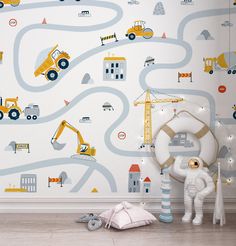 a child's room with construction themed wallpaper