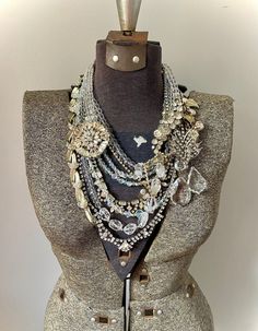 * This is a CUSTOM ORDER, please allow 2-3 weeks for creation! I will be in contact with you the entire time as you choose what specialized rhinestone pieces you want in your unique statement piece made just for you. * This bib style necklace can be worn at all times of the year and is sure to be a staple in your collection for many years to come. I've been really loving to create big crystal necklaces again with nothing BUT crystals an other shiny components. Most of the repurposed pieces in th Bridal Statement Necklace, Swarovski Brooch, Antique Silver Necklace, Vintage Rhinestone Necklace, Gold Bridal Necklace, Pearl Statement Necklace, Assemblage Necklace, Rhinestone Statement Necklace, Necklace Swarovski