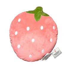 a pink strawberry pillow with white polka dots