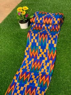 Kente fabric, Handwoven from Ghana. Kente yard is not the same as African fabric/ankara . This woven top-notch quality kente is not measured like the normal African fabric/Ankara. The Kente strips are joined together to make 2 yards for a piece in three to make 6 yards. The weavers weave it up to 14 or 15 stripes and join all the stripes to make the full 12 yards kente but when they weave it in small stripes it's either 17 or 18 stripes to make the full 12 yards kente. This is purely handwoven k Multicolor Cotton Fabric With Woven Motifs, Multicolor Woven Motifs Cotton Fabric, Multicolor Woven Cotton Fabric With Motifs, Traditional Multicolor Woven Fabric, Traditional Ankara Fabric Patterns, Kente Fabric, Kente Cloth, Knight Rider, Woven Top