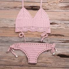 Get ready to hit the beach in style with our Imani Crochet Bikini Set! This handmade bikini features a beautiful crochet design and unique halter strap with sea shell accents. Made with high quality polyester, this bikini is perfect for lounging on the sand or taking a dip in the ocean. Get ready to turn heads and make a statement with our Imani Crochet Bikini Set! Specs: Material: Polyester Halter Bathing Suit, Tank Top Straps, Swimwear Sets, 2 Piece Swimsuits, Beach Swimwear, Sleeveless Dress Summer, Bottom Clothes, Lace Bralette, Crochet Designs