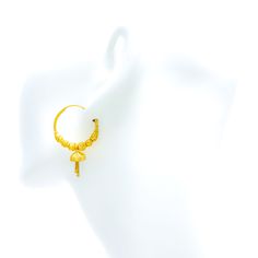 These exquisite 22k gold hoop earrings, weighing 8.4 grams, feature a refined design that exudes elegance and sophistication. The yellow gold finish enhances their radiant appeal, making them a perfect accessory for any occasion. With a diameter of 1.1 inches and a length of 1.75 inches, these Bali/hoop earrings offer a stylish and comfortable fit. Ideal for those who appreciate high-quality craftsmanship and timeless beauty, these refined earrings are a cherished addition to any jewelry collection. Product Details Gold Purity(karat): 22k Gold Weight(grams): 8.4 Item Finish: Yellow Gold Earring Style: Bali/Hoop Earring Earring Diameter: 1.1" Earring Length: 1.75" Luxury 22k Gold Hoop Earrings, 22k Yellow Gold Hoop Earrings, Ornate 22k Gold Earrings, Luxury Red 22k Gold Earrings, Traditional Yellow Gold Nickel-free Hoop Earrings, Bridal Jewelry Necklace, Precious Stones Rings, Diamond Pendant Sets, Fancy Necklace