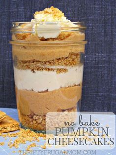 no bake pumpkin cheesecakes in a jar with graham crackers on the side