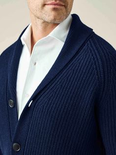 This shawl collar cardigan is knitted in Bergamo, Northern Italy, with 100% four-ply cashmere from the prestigious Cariaggi Fine Yarns Collection, using gauge five with a weight of circa 800 gr.This cardigan is crafted with a ribbed handle that locks in warmth and feels superbly soft but robust. It fastens with classic horn buttons and has elegant double-fronted pockets. Our distinguished shawl collar sits neatly over both button-downs and crew-neck tees to create a timeless look. Designed for a Elegant Merino Wool V-neck Outerwear, Elegant Cashmere Cardigan For Business Casual, Elegant Fitted Cardigan With Shawl Collar, Elegant Fitted Shawl Collar Cardigan, Elegant Business Sweater For Winter, Elegant Winter Business Sweater, Elegant Business Winter Sweater, Elegant Wool Cardigan With Shawl Collar, Formal Shawl Collar Winter Cardigan