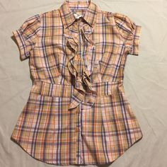 Fitting Plaid Striped Shirt. Brand New, Has Never Been Worn, Tag Fell Off But Even Still Has The Plastic Holding The Extra Button It Came With (Pic 2). Make An Offer Orange Short Sleeve Casual Blouse, Orange Casual Short Sleeve Blouse, Casual Short Sleeve Orange Blouse, Casual Orange Short Sleeve Blouse, Orange Cotton Blouse For Work, Orange Short Sleeve Blouse With Ruffles, Orange Ruffled Short Sleeve Blouse, Orange Button-up Cotton Blouse, Orange Cotton Button-up Blouse