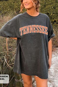 This vintage-style Tennessee Shirt is the perfect summer beach clothing choice, featuring an oversized Comfort Colors tee with a trendy coconut girl aesthetic-- it's perfect for a college game day outfit or just a cute summer look. Cheap Trendy School T-shirt, Cheap College Tops With Screen Print, Cheap Trendy Medium Wash Shirt, Cheap Graphic Tee Shirt For College, Cheap Cute College Shirt, Affordable Trendy Shirt For College, Cheap Oversized T-shirt For Summer, Trendy Everyday Cheap T-shirt, Cute Comfy Oversized Tshirts