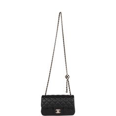 This Pearl Crush Mini Rectangular flap bag is of black lambskin with light gold tone hardware and has a front flap with signature CC turnlock closure, rear half moon pocket, single interwoven black leather and light gold tone chain link shoulder/crossbody strap with adjustable "pearl" ball. The interior is lined in gold leather and features a zipper pocket with Chanel pull and an open pocket below. Collection: 23C Origin: Italy Condition: Pristine; new or never Accompanied by: Chanel box, Chanel Chanel Pearl Crush, Chanel Pearl, Chanel Box, Chanel Pearls, Gold Leather, Flap Bag, Half Moon, Crossbody Strap, Brunei