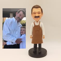 a bobble head is shown next to an image of a man holding a child