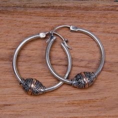 Fair Trade Gold Accent and Sterling Silver Hoop Earrings - Lotus Seed | NOVICA Borobudur Temple, Lotus Seed, Sterling Silver Hoop Earrings, Big Earrings, Handcrafted Earrings, Silver Bead, Gold Accent, Buy Gold, Sterling Silver Hoops