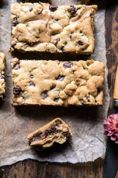 chocolate chip cookie bars with peanut butter on top