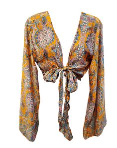 Get comfy in style with our Orange Blossom Boho Bell Sleeve Tie Top! Featuring adjustable tie front and bell sleeves, this top is perfect for the free-spirited fashionista. Let the paisley print add some hippie vibes to your wardrobe! (Free-spirited fashion included!) Bell Sleeve Shirts, Multicolor Wrap Top For Fall, Flowy Long Sleeve Tops With A Free-spirited Style, Hippie Patterned Tops For Fall, Fitted V-neck Bohemian Peasant Top, Spring Hippie Top With Boho Print, Spring Hippie Tops With Boho Print, Flowy Printed Hippie Blouse, Spring Hippie Patterned Top