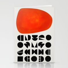 a card with an orange and black design on it