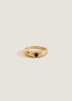 Handcrafted in LA, this timeless piece is adorned with your birthstone for a personalized addition to your ring stack. Our stones are 100% natural, meaning they're not dyed or heat treated and no stone is exactly alike.Amethyst is February's birthstone and represents peace, clarity, and inner strength. It promotes a ca Amethyst Center Stone Birthstone Ring In Yellow Gold, Yellow Gold Birthstone Ring With Amethyst Center Stone, Timeless Amethyst Promise Ring, Heirloom Amethyst Solitaire Ring, Classic Purple Gemstone Birthstone Ring, Classic Gemstone Birthstone Ring For Promise, Classic Purple Birthstone Ring With Gemstone, Classic Birthstone Open Ring With Gemstone, Classic Amethyst Birthstone Ring With Accent Stones