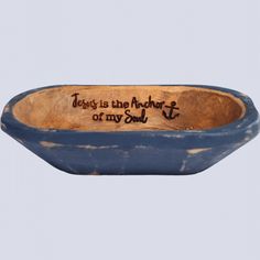 a wooden bowl with writing on it that says jesus is the anchor of my soul