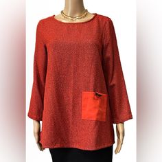 Ali Miles Round Neck 3/4 Drop Shoulder Sleeve Textured Sienna Tunic Size M, S. New With Tag From Ali Miles Plus, This Tunic Features: Woven Fabrication Round Neckline 3/4 Drop Shoulder Sleeves Front Side Patch Pockets Slight High-Low Hemline Pullover Construction Approx 27.5" Front And Back Length, 19" Pit To Pit Laid Flat Size Small 28.5" Length, 20" Pit To Pit Laid Flat Size Med Rayon/Polyester,Cotton Machine Wash/Tumble Dry Imported Red Long Sleeve Blouse With Pockets, Red 3/4 Sleeve Tops For Work, Fall Blouse With Pockets And 3/4 Sleeves, Drop Shoulder Sleeve, Shoulder Sleeve, M S, Drop Shoulder, Round Neckline, High Low