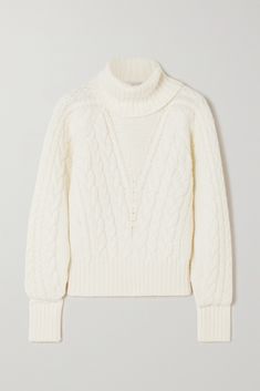 Emilia Wickstead's knitwear is as timeless as its elegant dresses. Designed for a slim fit, this sweater is cable-knitted from naturally insulating wool. Complement the turtleneck with oversized gold hoops. Elegant Wool Sweater With Pointelle Knit, Elegant Merino Wool Cable Knit Sweater, Elegant Winter White Cable Knit Sweater, Elegant Chunky Knit Sweater, Elegant Cable Knit Turtleneck Sweater, Elegant Cream Chunky Knit Sweater, Elegant Winter White Knit Sweater, Elegant Winter White Textured Knit Sweater, Elegant Textured Knit Sweater In Winter White